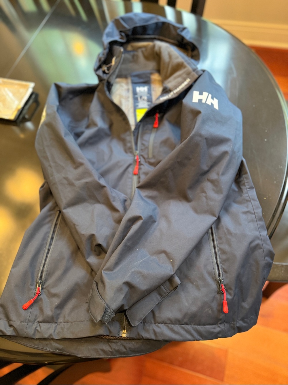Helly Hansen women’s Dark Blue Rain Jacket with Red Accents